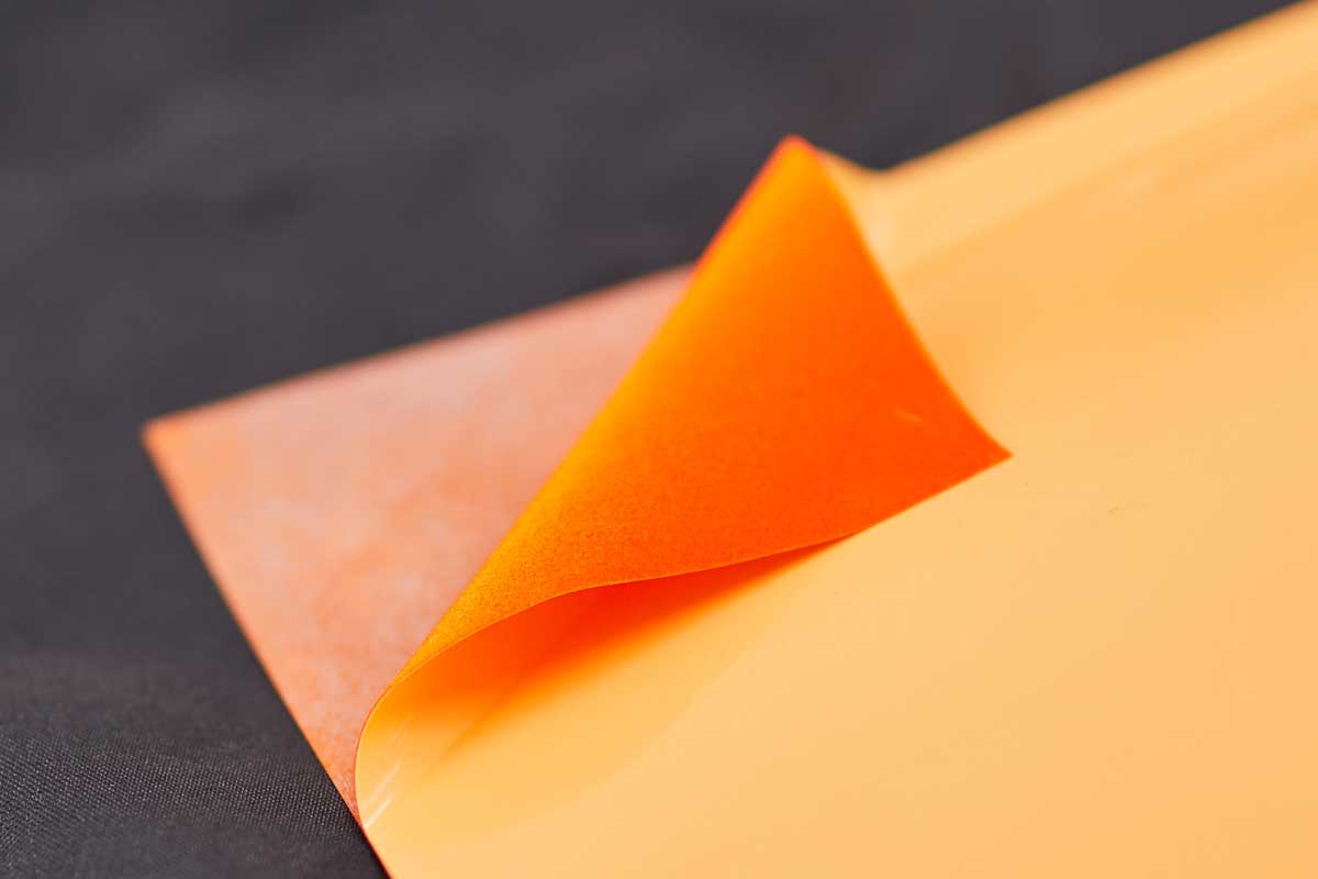 Orange Key Flockprint Druckmaterial in Orange und Gelb.